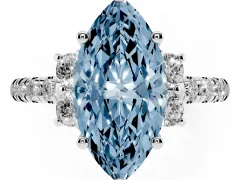 Fancy Blue Marquise Cut Diamond Three-Stone Pavé Ring Set in White gold with Prong Setting