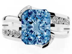 Fancy Blue Radiant Cut Diamond Solitaire Ring Set in White gold with Channel Set Split Shank and Tension Prongs