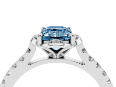 Fancy Blue Emerald Cut Diamond Solitaire Ring Set in White gold with Pavé Band and Floral Prong Setting