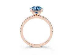 Fancy Blue Round Cut Diamond Pavé Solitaire Ring Set in Rose gold with Round Band Accents and Prong Setting
