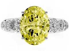 Fancy Yellow Oval Cut Diamond Solitaire Ring Set in White gold with Pavé-Set Band and Prong Setting