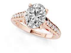 Oval Cut Diamond Prong Set Solitaire Engagement Ring Set in Rose gold with Pavé Band