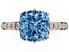 Fancy Blue Cushion Cut Diamond Solitaire Engagement Ring Set in Rose gold with Pavé Band and Prong Setting