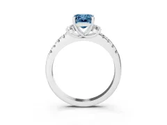 Fancy Blue Emerald Cut Diamond Three-Stone Pavé Ring Set in White gold with Prong Setting