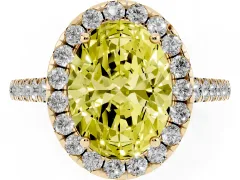 Fancy Yellow Oval Cut Diamond Halo Pavé Engagement Ring Set in Yellow gold with Prong Setting