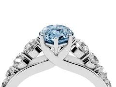 Fancy Blue Marquise Cut Diamond Solitaire Ring Set in White gold with Pavé-Set Band and Prong Setting