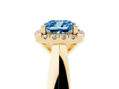 Fancy Blue Cushion Cut Diamond Halo Solitaire Engagement Ring Set in Yellow gold with Square Band and Prong Setting