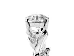 Round Cut Diamond Solitaire Ring Set in White gold with Twisted Marquise Accent Band