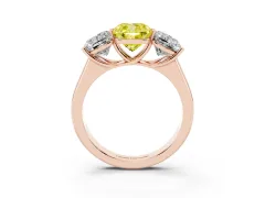 Fancy Yellow Cushion Cut Diamond Three-Stone Ring Set in Rose gold with Plain Polished Band