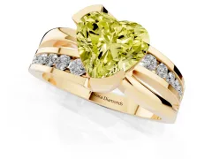 Fancy Yellow Heart Cut Diamond Solitaire Ring Set in Yellow gold with Channel Set Split Shank and Tension Prongs