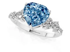 Fancy Blue Heart Cut Diamond Ring Set in White gold with Scattered Round Accents
