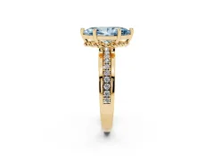 Fancy Blue Marquise Cut Diamond Solitaire Ring Set in Yellow gold with Channel Set Band and Prong Setting