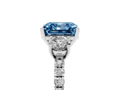 Fancy Blue Asscher Cut Diamond Three-Stone Ring Set in Platinum with Pavé Band and Graduated Sides