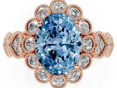 Fancy Blue Oval Cut Diamond Solitaire Ring Set in Rose gold with Milgrain Pavé Heart Band