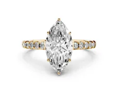 Marquise Cut Diamond Solitaire Engagement Ring Set in Yellow gold with Pavé Band and Prong Setting