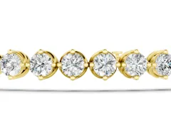 Round Cut Diamond Twisted Band Tennis Bracelet Set in Yellow gold with Prong Setting