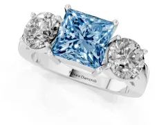 Fancy Blue Princess Cut Diamond Three-Stone Ring Set in Silver with Round Side Stones and Classic Band
