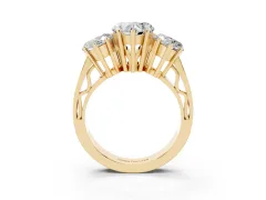 Heart Cut Diamond Three-Stone Ring Set in Yellow gold with Textured Band