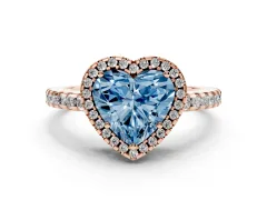 Fancy Blue Heart Cut Diamond Halo Ring Set in Rose gold with Pavé Shoulders and Halo-Framed Center