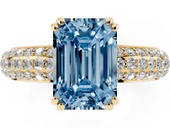 Fancy Blue Emerald Cut Diamond Solitaire Ring Set in Yellow gold with Multi-Row Round Pavé Band and Prong Setting