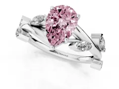Fancy Pink Pear Cut Diamond Solitaire Ring Set in White gold with Twisted Marquise Accent Band
