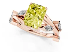 Fancy Yellow Radiant Cut Diamond Solitaire Ring Set in Rose gold with Twisted Marquise Accent Band