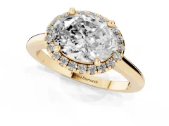 Oval Cut Diamond Halo Engagement Ring Set in Yellow gold with Pavé Band and Rising Shoulders