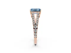 Fancy Blue Emerald Cut Diamond Split Shank Pavé Engagement Ring Set in Rose gold with Prong-Held Center Stone
