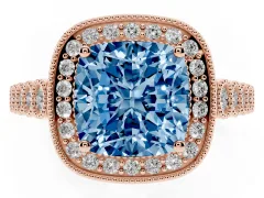 Fancy Blue Cushion Cut Diamond Milgrain Halo Solitaire Ring Set in Rose gold with Bezel Set Side Stones and Pavé Band