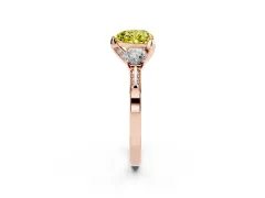 Fancy Yellow Heart Cut Diamond Three-Stone Ring Set in Rose gold with Pavé Band and Smaller Side Stones