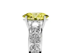 Fancy Yellow Oval Cut Diamond Solitaire Ring Set in Platinum with Pavé-Set Band and Prong Setting