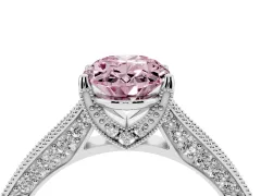 Fancy Pink Oval Cut Diamond Solitaire Ring Set in Platinum with Milgrain-Edged Pavé Band and Prong Setting