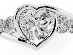 Heart Cut Diamond Bezel Bypass Ring Set in White gold with Round Accents