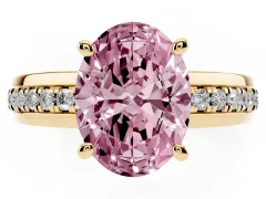 Fancy Pink Oval Cut Diamond Solitaire Ring Set in Yellow gold with Channel Set Band and Prong Setting