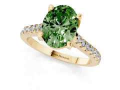 Fancy Green Oval Cut Diamond Solitaire Ring Set in Yellow gold with Brilliant Pavé Band and Prong Setting