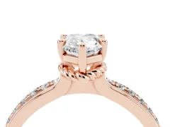 Pear Cut Diamond Solitaire Ring Set in Rose gold with Channel Set Band and Prong Setting
