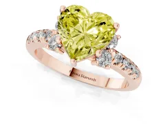 Fancy Yellow Heart Cut Diamond Three-Stone Pavé Ring Set in Rose gold with Prong Setting