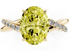 Fancy Yellow Oval Cut Diamond Twisted Pavé Band Ring Set in Yellow gold with Prong Setting