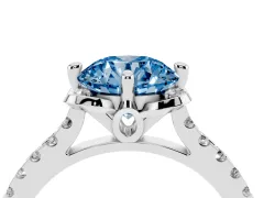 Fancy Blue Round Cut Diamond Solitaire Ring Set in Silver with Pavé Band and Floral Prong Setting
