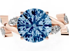 Fancy Blue Round Cut Diamond Solitaire Ring Set in Rose gold with Twisted Marquise Accent Band
