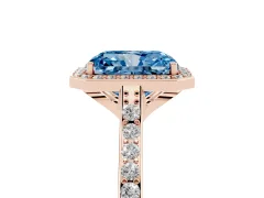 Fancy Blue Radiant Cut Diamond Halo Engagement Ring Set in Rose gold with Round Pavé Shoulders and Heart Gallery