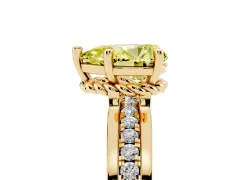 Fancy Yellow Pear Cut Diamond Solitaire Ring Set in Yellow gold with Channel Set Band and Prong Setting