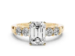Emerald Cut Diamond Five-Stone Prong Set Engagement Ring Set in Yellow gold with Channel Band