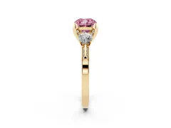 Fancy Pink Cushion Cut Diamond Three-Stone Ring Set in Yellow gold with Pavé Band and Smaller Side Stones