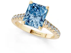 Fancy Blue Radiant Cut Diamond Solitaire Ring Set in Yellow gold with Brilliant Pavé Band and Prong Setting