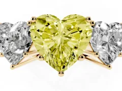 Fancy Yellow Heart Cut Diamond Three-Stone Ring Set in Yellow gold with Textured Band