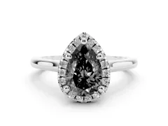 Fancy Black Pear Cut Diamond Halo Engagement Ring Set in White gold with Pavé Band and Rising Shoulders
