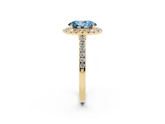 Fancy Blue Oval Cut Diamond Halo Pavé Engagement Ring Set in Yellow gold with Prong Setting