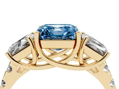 Fancy Blue Asscher Cut Diamond Three-Stone Ring Set in Yellow gold with Pavé Band