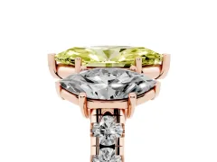 Fancy Yellow Marquise Cut Diamond Three-Stone Ring Set in Rose gold with Pavé Band